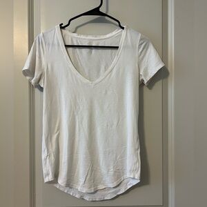 Lululemon size 4 white V-neck shirt